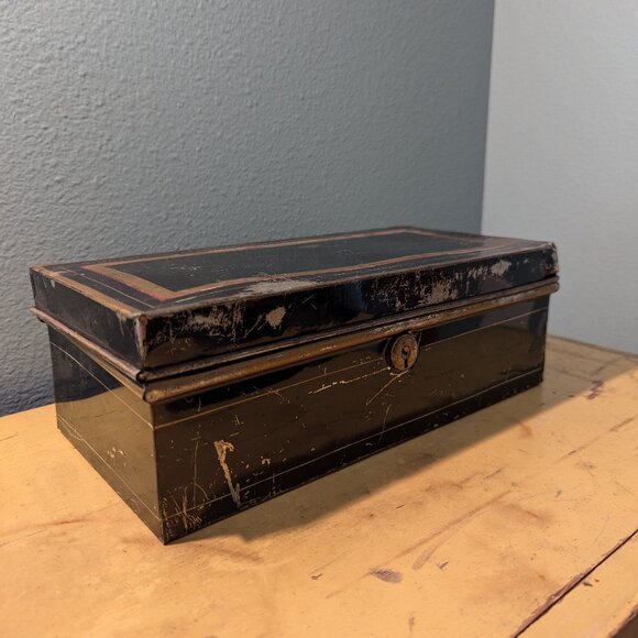 Antique tin safety deposit box